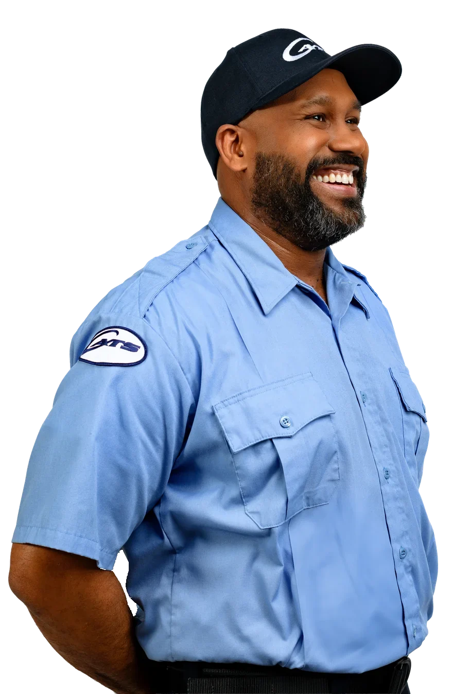 Smiling CATS bus operator in a CATS cap and uniform